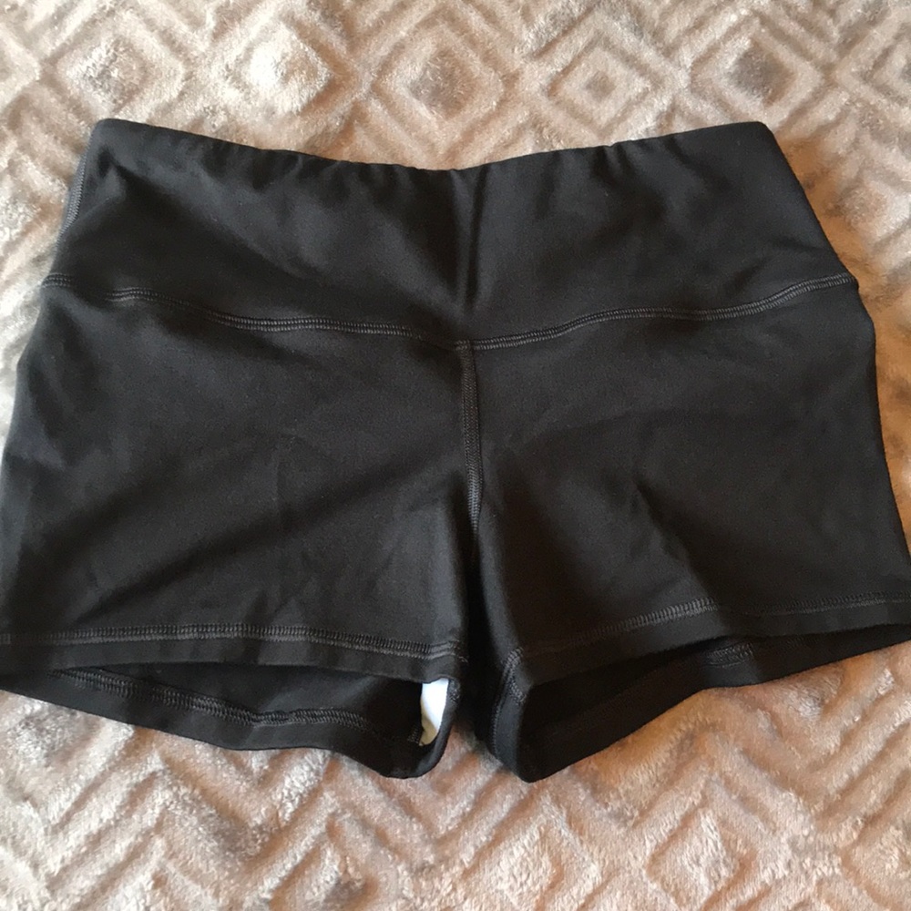 Black Fleos. Original inseam, high waisted